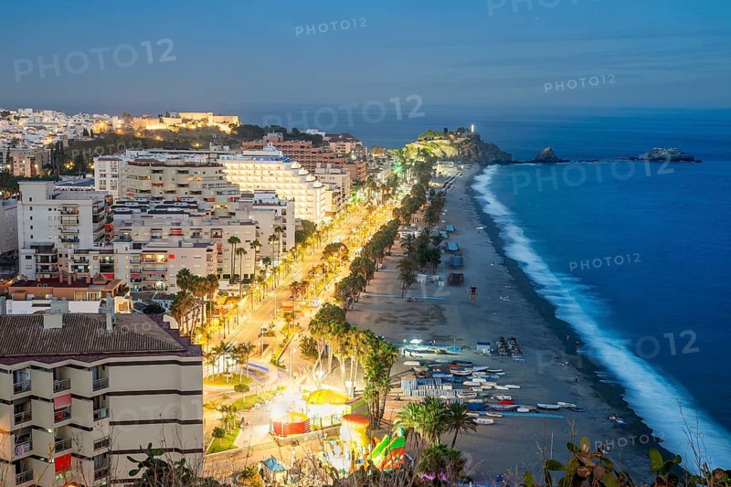 Panorama of touristic illuminated coast in Almunecar at night