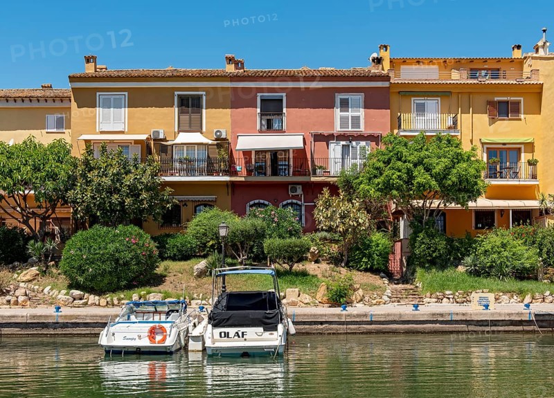Yachts and colorful houses