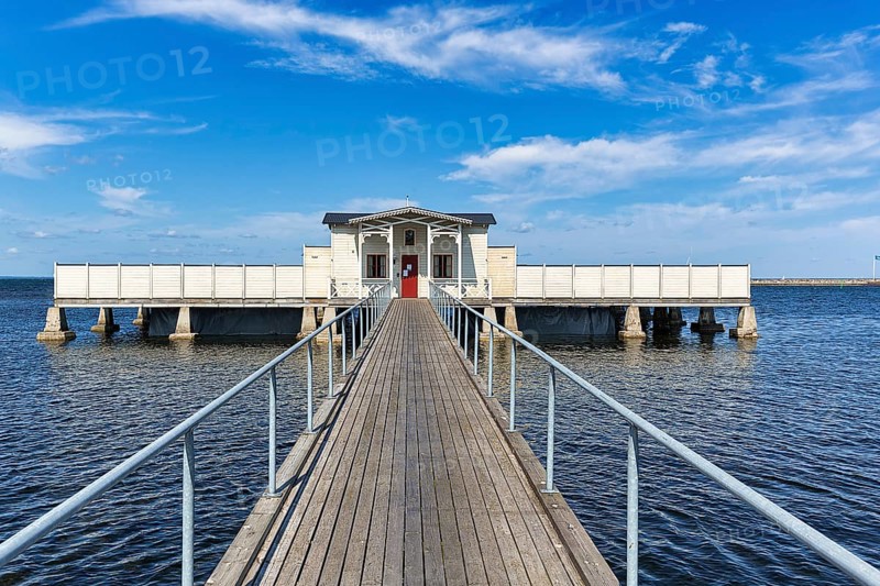 White cold bathhouse by the Baltic Sea