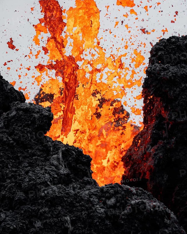 Erupting volcano with lava