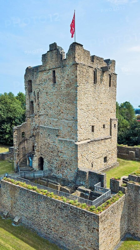 Fortified castle tower of partially reconstructed former moated castle Burg Altendorf from the Middle Ages