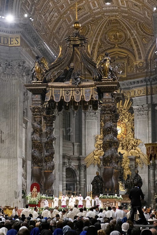 Pope celebrates Saint Mass in St Peter's Basilica in front of faithful Christians