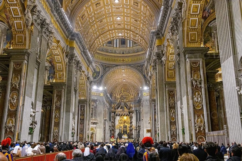 Pope celebrates Saint Mass in St Peter's Basilica in front of faithful Christians