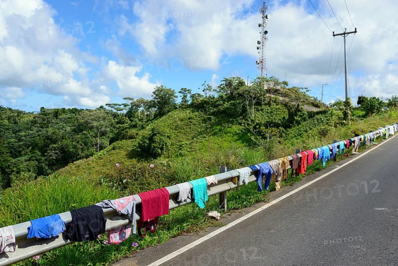 Laundry drying on guardrail