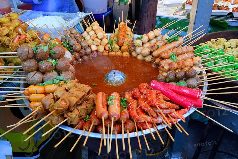 Various skewers with meat and seafood