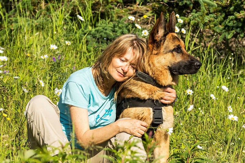Woman and German Shepherd