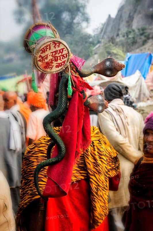 Snake charmer with cobra