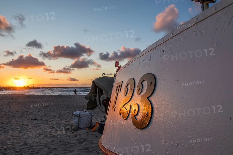 Fishing boat in sunset