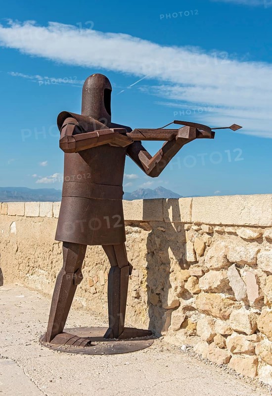 Metal statue of knight in armor