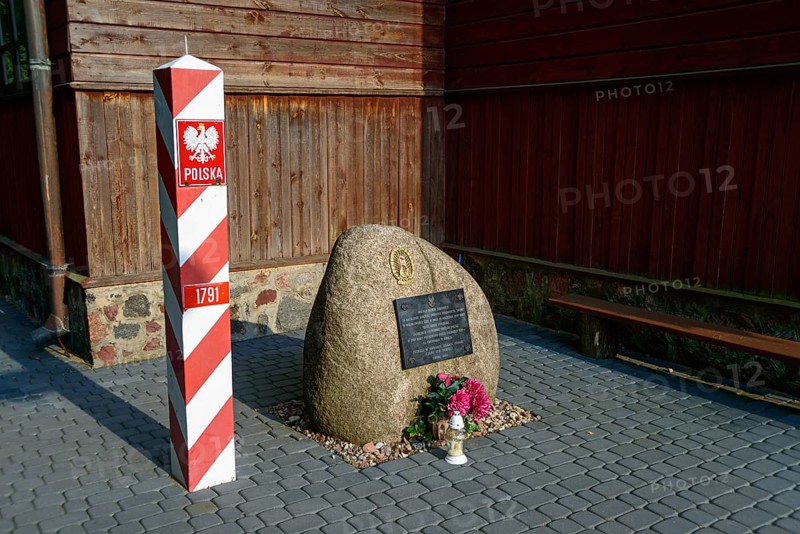 Memorial stone at the wooden church