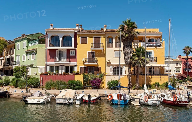 Yachts and colorful houses