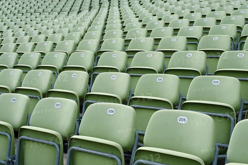 Green folding seats on the grandstand of the Seebuehne