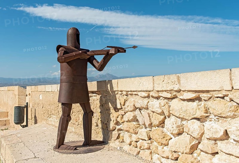 Metal statue of knight in armor