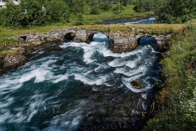 Stone bridge on the road to Briksdalsbreen