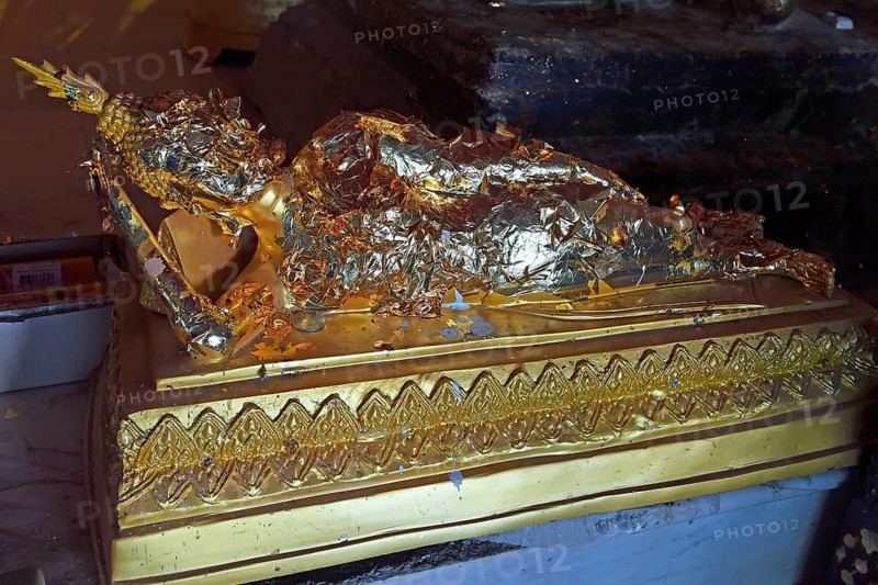 Buddha statue covered with gold leaf