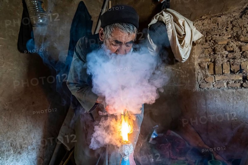 Sufi man smoking marihuana