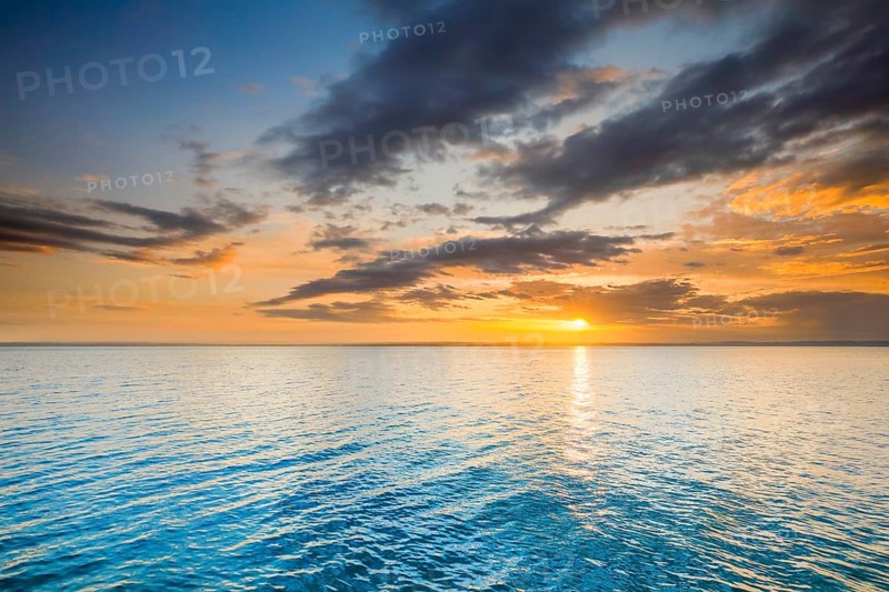 View from Arbon over Lake Constance at colourful sunrise