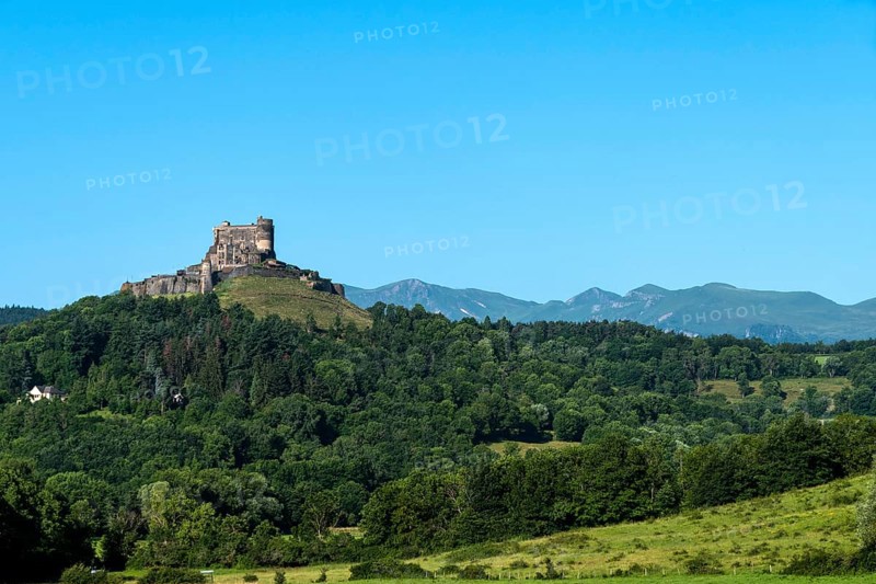 Castle of Murol and view on Sancy massif in Auvergne Volcanoes Natural Park