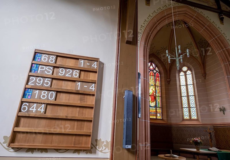 Panel with posted songs in the protestant town church