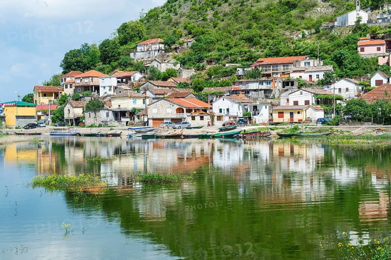 Small village reflected in the water