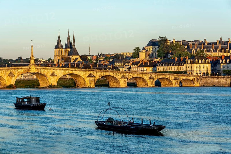 View on bridge Jacques Gabriel and the town of Blois at sunrise