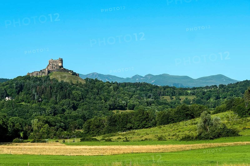 Castle of Murol and view on Sancy massif in Auvergne Volcanoes Natural Park