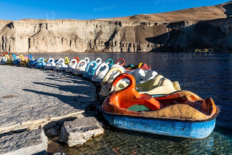 Paddleboats on the shore of a lake in the Unesco National Park
