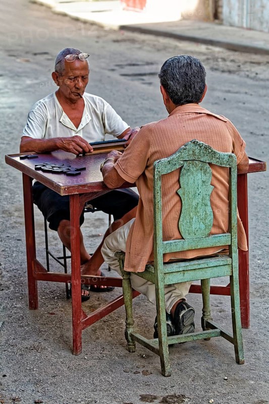 Two dark-skinned old men