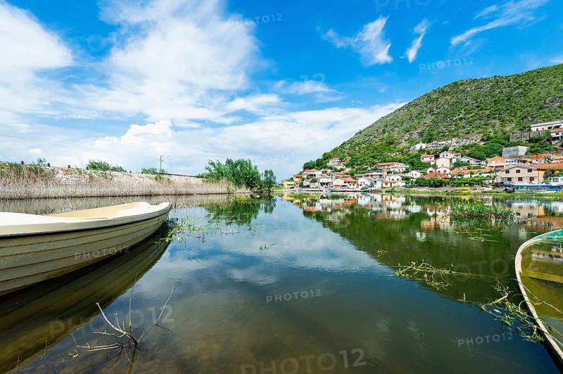Small village reflected in the water