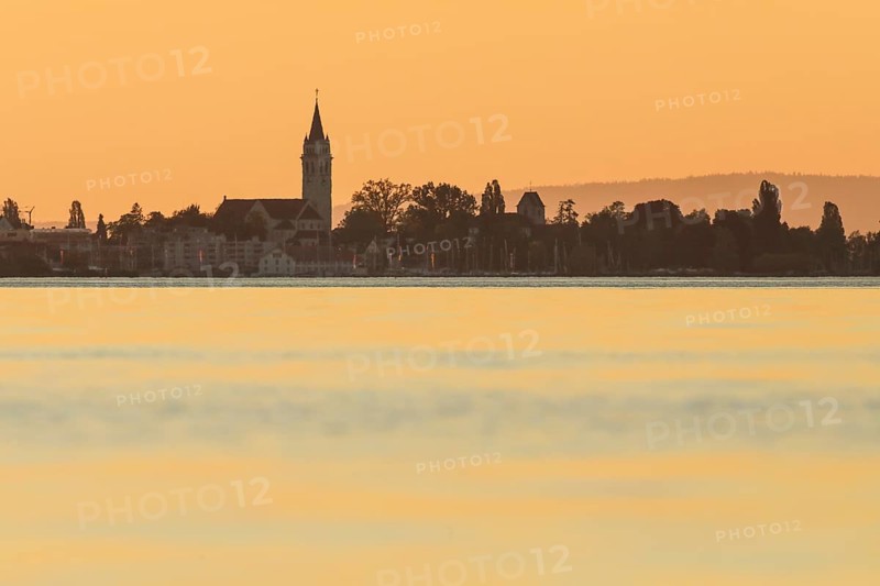 Church and harbour of Romanshorn in the evening light