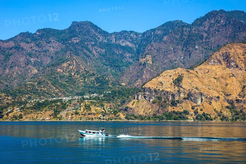 Lake Atitlan framed by volcanoes