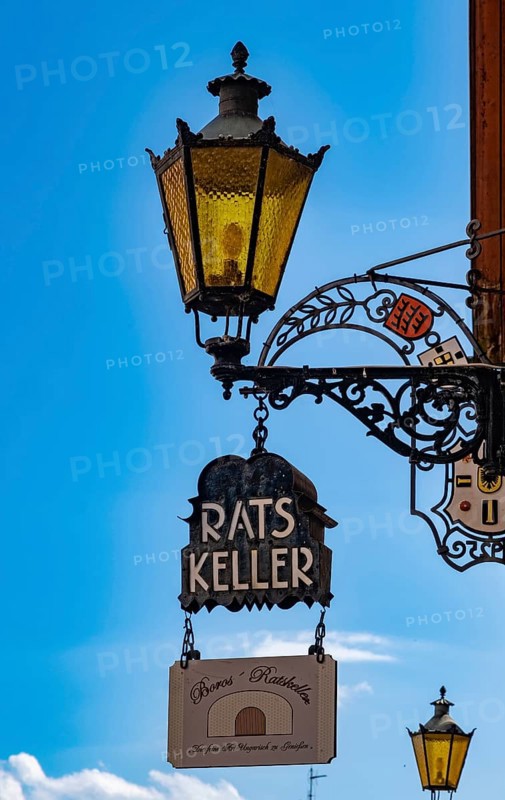 Sign from the Ratskeller and lamp