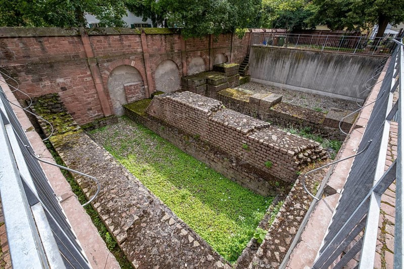 Exposed remains of the Roman basilica next to the Catholic Church of junglefowl (Gallus)