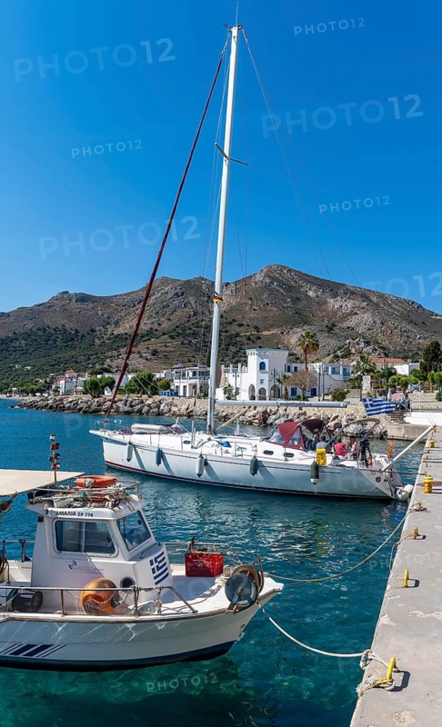 Sailboats in the harbour of Livadia on Tilos Island