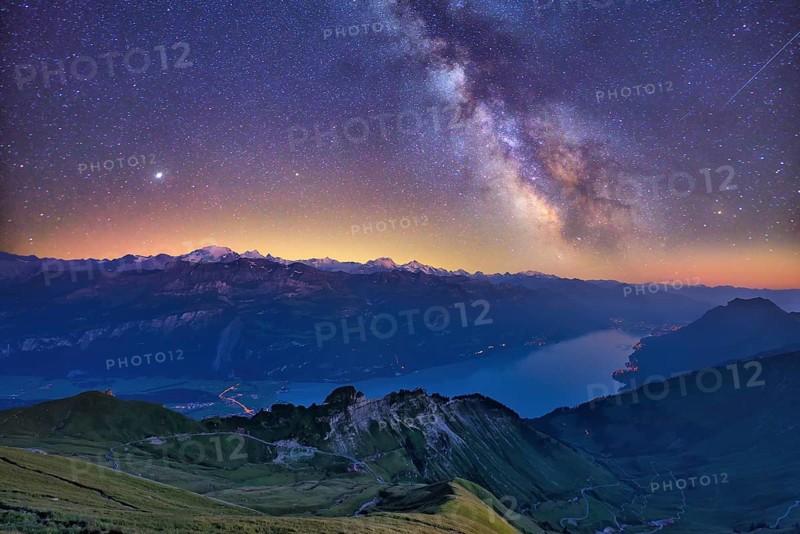 View of Lake Brienz with starry sky and Milky Way from Brienzer Rothorn