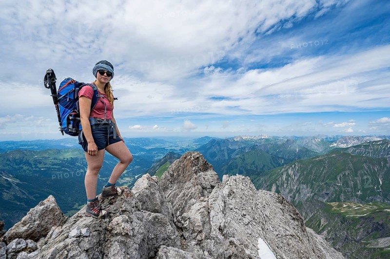 Mountaineer at the summit of the Maedelegabel