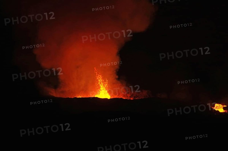 Lava fountains shoot into the sky