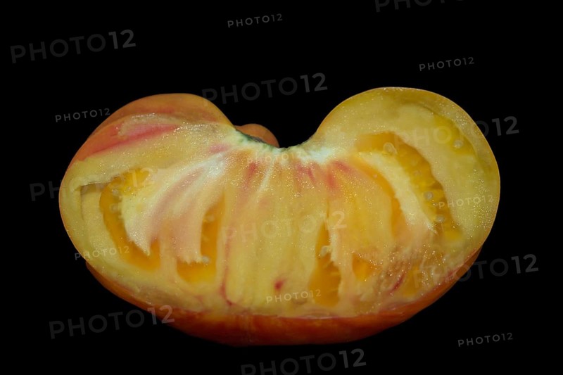 Halved tomato of the old oxheart variety
