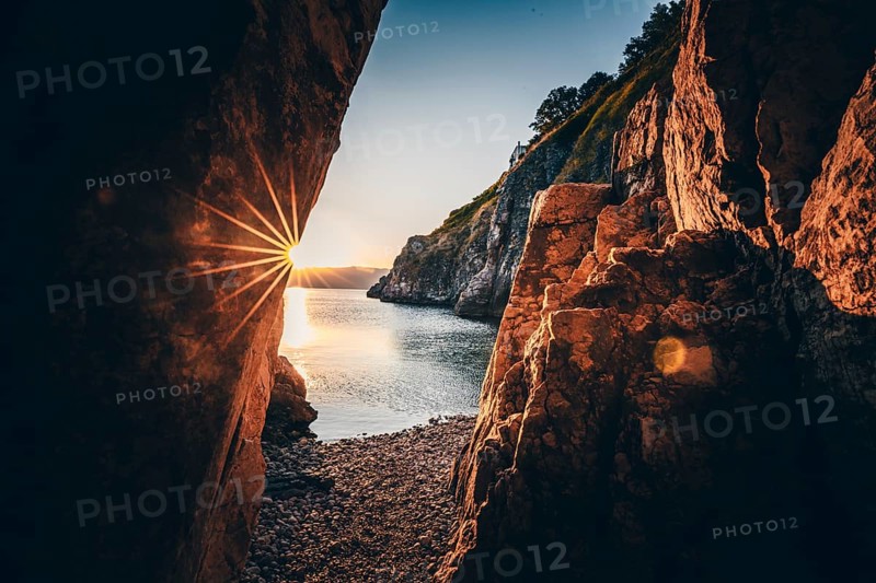 A small stone beach by the sea