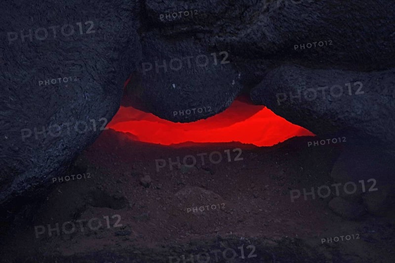 Magma glows under cooled lava