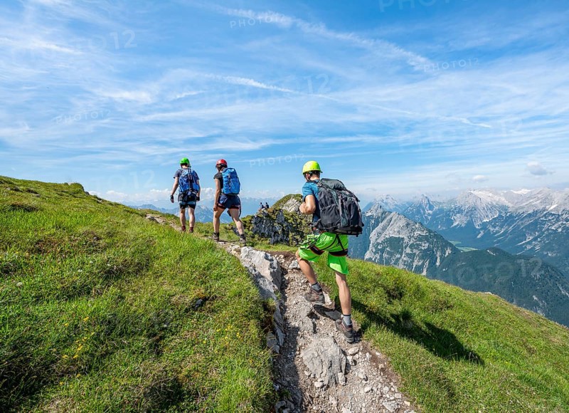 Mountaineers hiking on the via ferrata Mittenwalder Hoehenweg