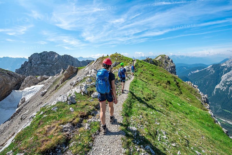Mountaineers hiking on a ridge