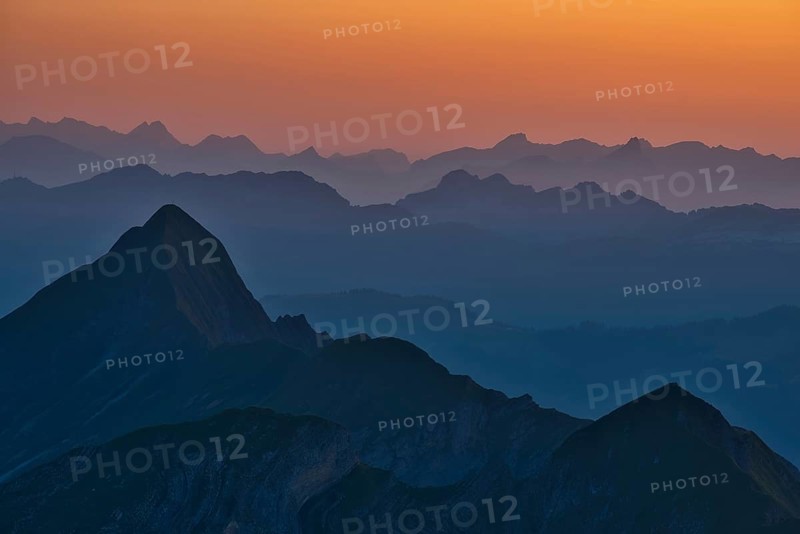 View of Bernese Alps at dusk from Brienzer Rothorn