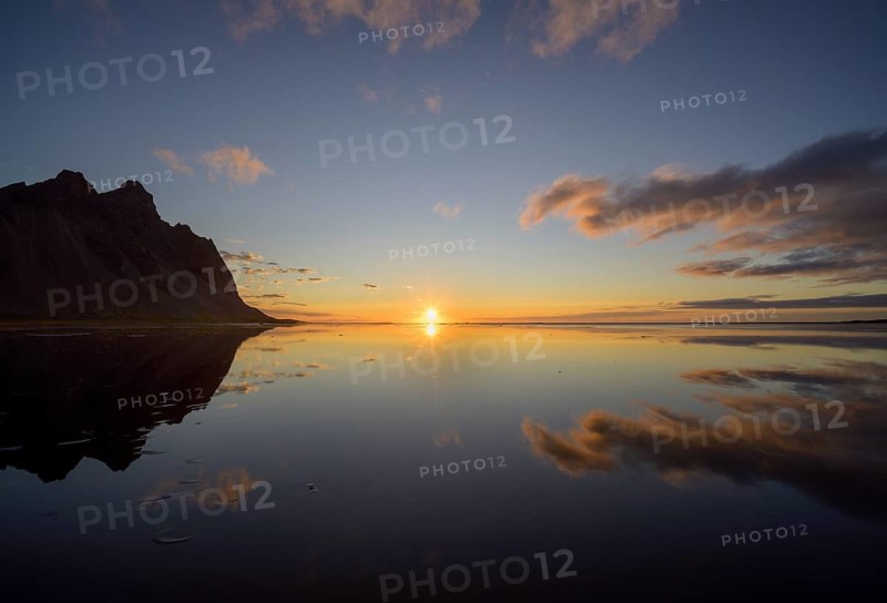 Sunrise on the beach over the sea