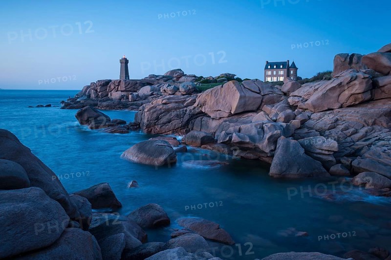 Bay with house and lighthouse