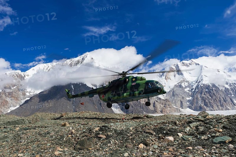Helicopter landing at Khan Tengri Base Camp