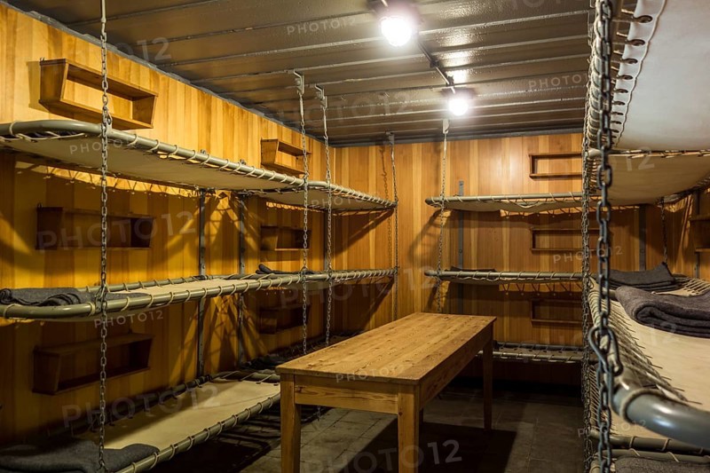 German WWII sleeping quarters with bunk beds in the bunker at Raversyde Atlantikwall