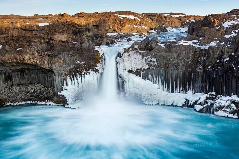 Aldeyjarfoss waterfall by the SkjsslfandafljÂ¾t river in winter in the north-eastern region