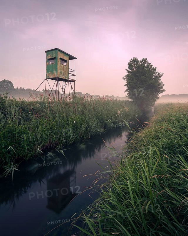 German floodplain landscape in Brandenburg with high seat on the Nuthe
