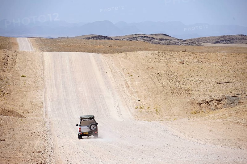 Car on road C14 between Solitaire and Kuiseb Pass